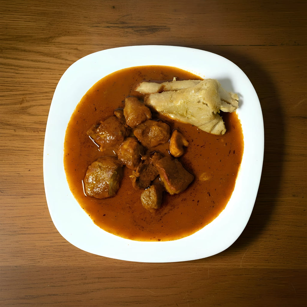 CARNE DE CERDO EN SALSA DE GUAJILLO CON CORUNDAS